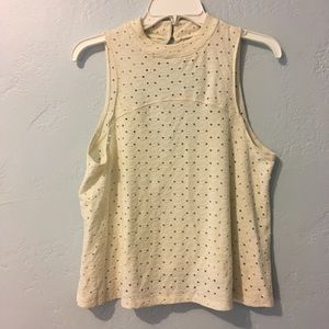 Cream sleeveless eyelet blouse
